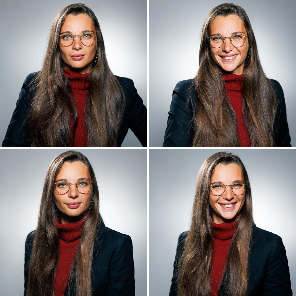 Portrait corporate en studio à Paris d'une professionnelle avec lunettes et cheveux longs.